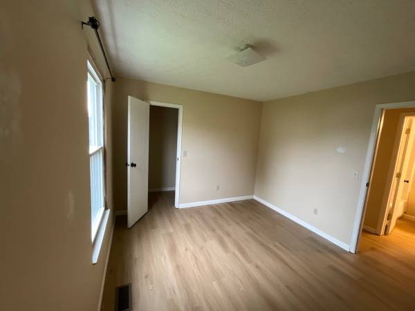 Spotless empty bedroom after move-out cleaning