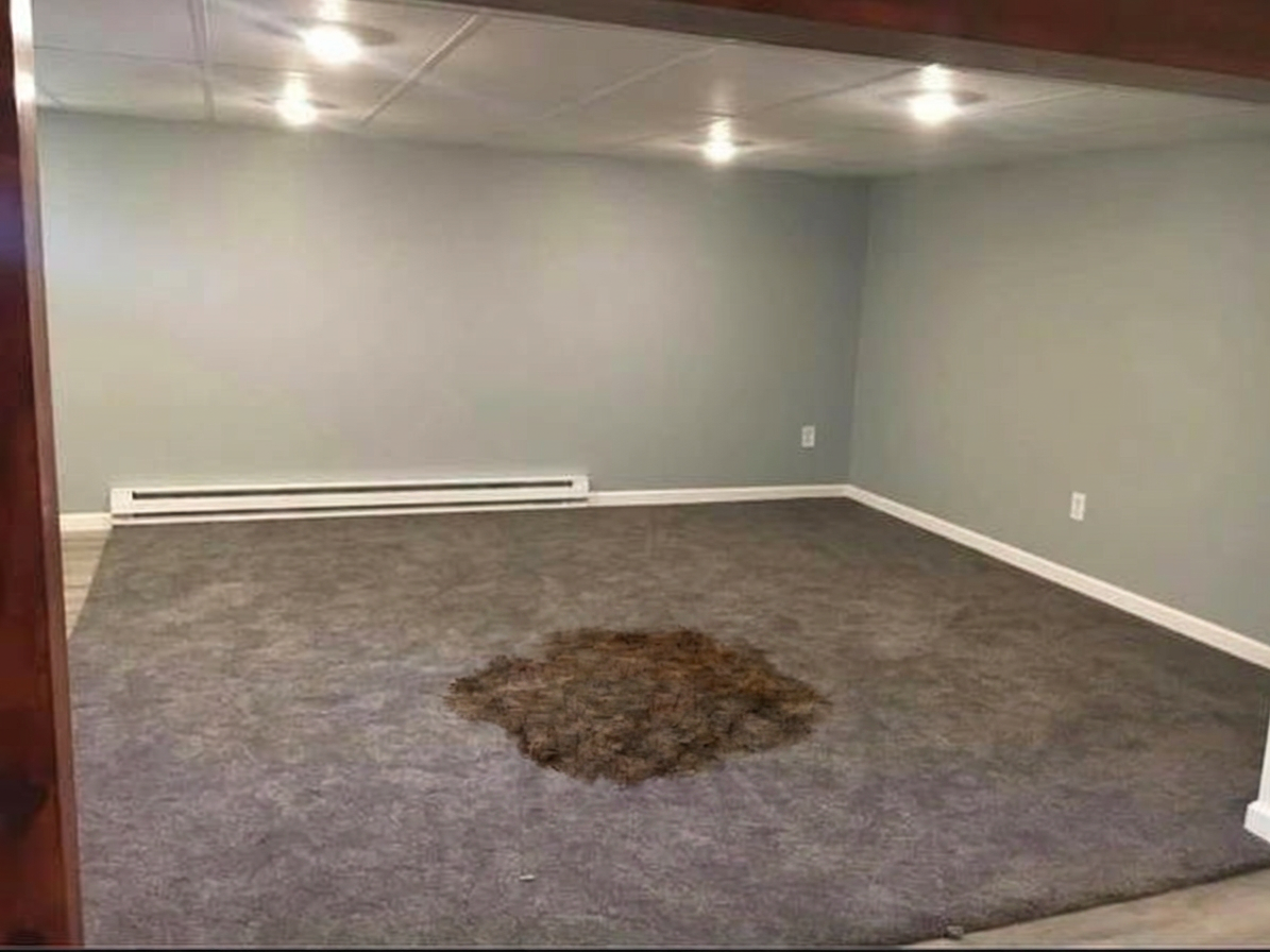Carpet with large stain before cleaning