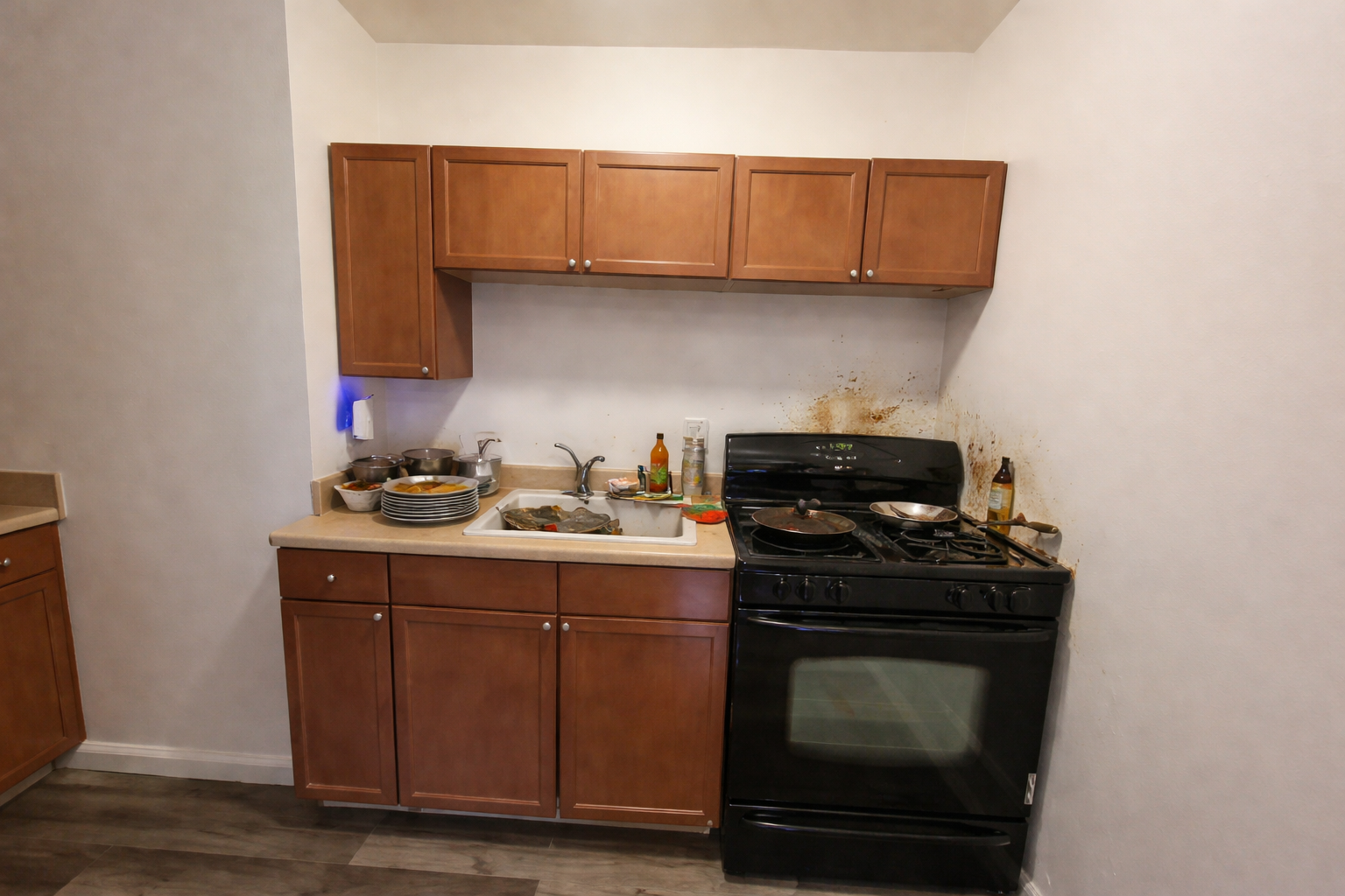 Dirty kitchen with grease stains before cleaning